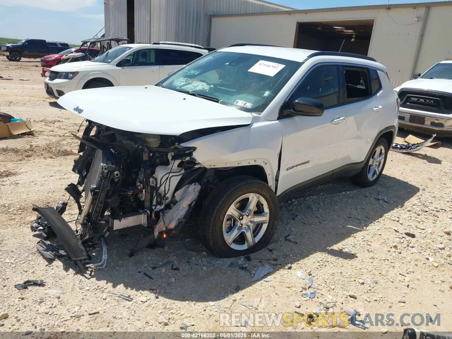 2 Photograph of a damaged car 3C4NJDBN4RT604198 JEEP COMPASS 2024