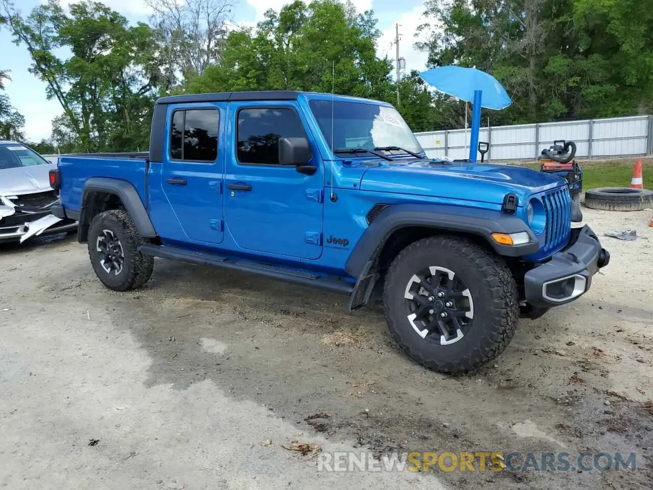 4 Photograph of a damaged car 1C6HJTAG4PL562366 JEEP GLADIATOR 2023