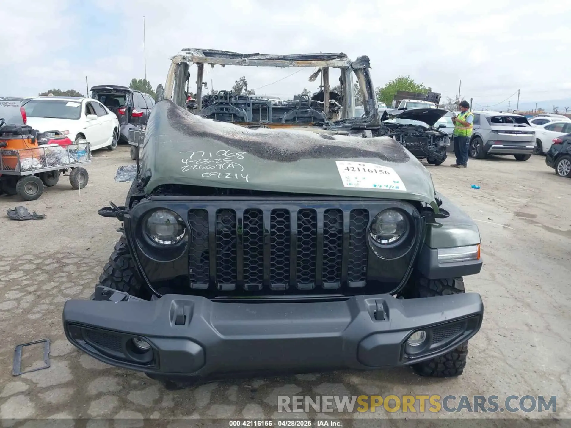 11 Photograph of a damaged car 1C6HJTAG7PL582515 JEEP GLADIATOR 2023