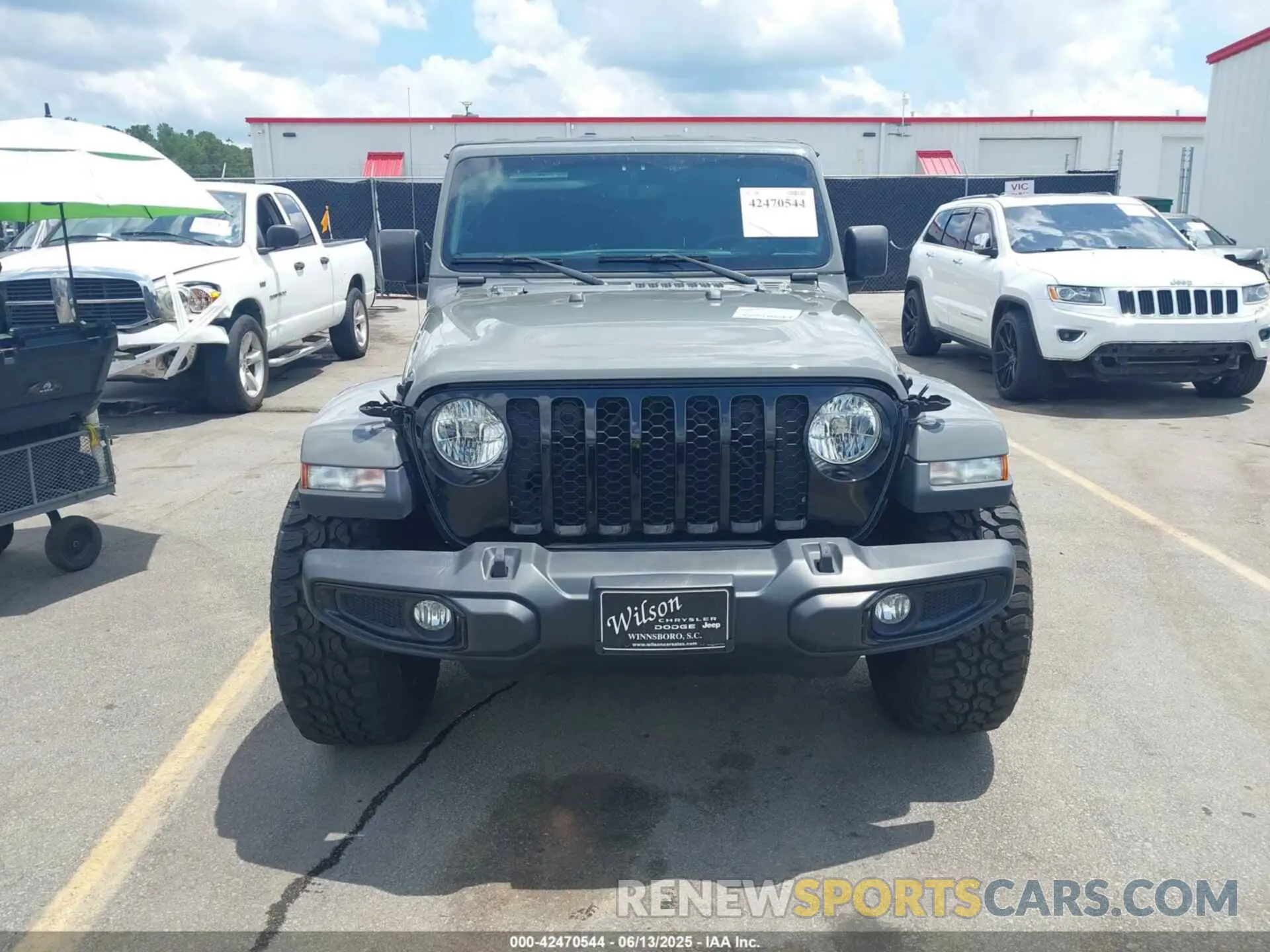 12 Photograph of a damaged car 1C6HJTAGXPL531557 JEEP GLADIATOR 2023