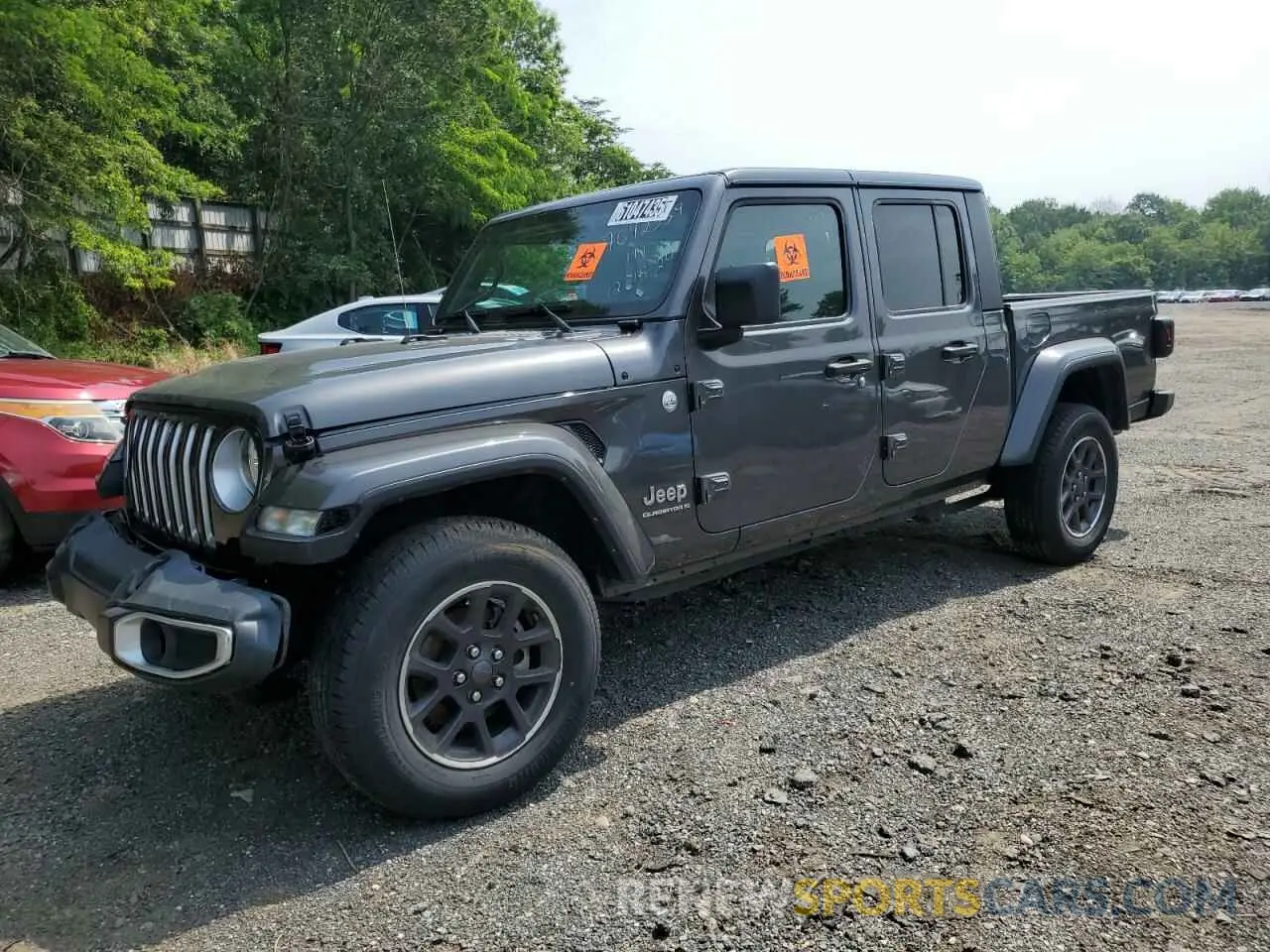 1 Photograph of a damaged car 1C6HJTFGXPL523659 JEEP GLADIATOR 2023