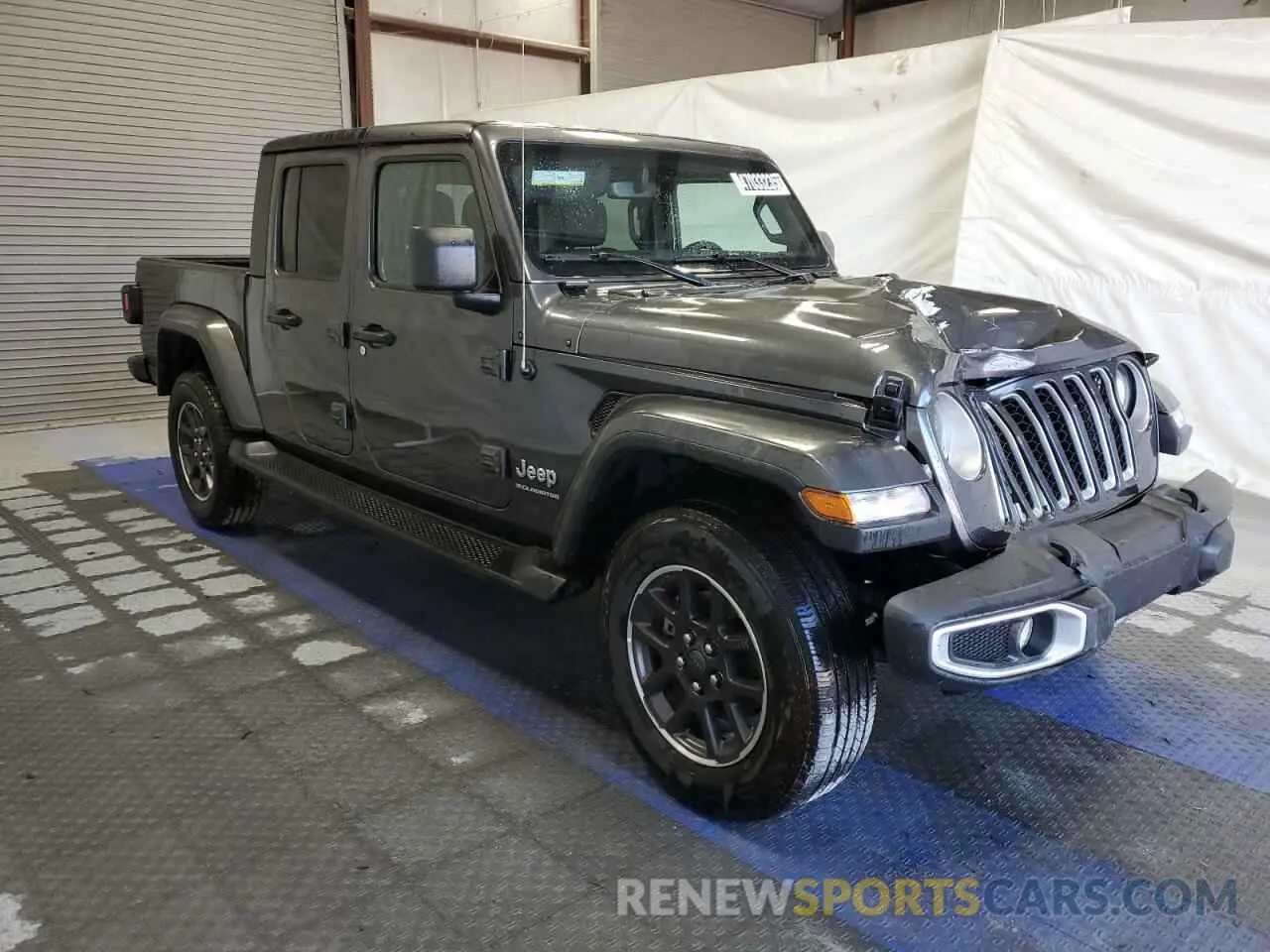 4 Photograph of a damaged car 1C6HJTFGXPL560873 JEEP GLADIATOR 2023
