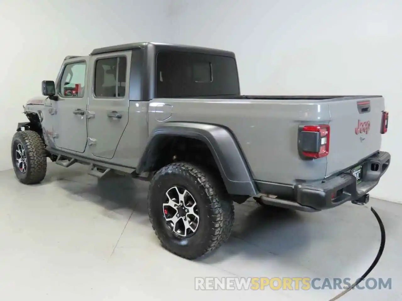 4 Photograph of a damaged car 1C6JJTBG4PL562478 JEEP GLADIATOR 2023