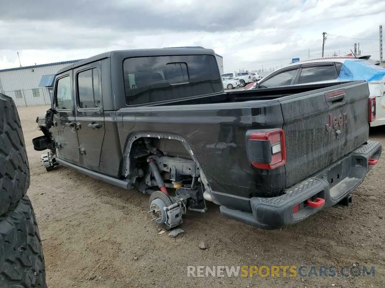2 Photograph of a damaged car 1C6JJTBG7PL573197 JEEP GLADIATOR 2023