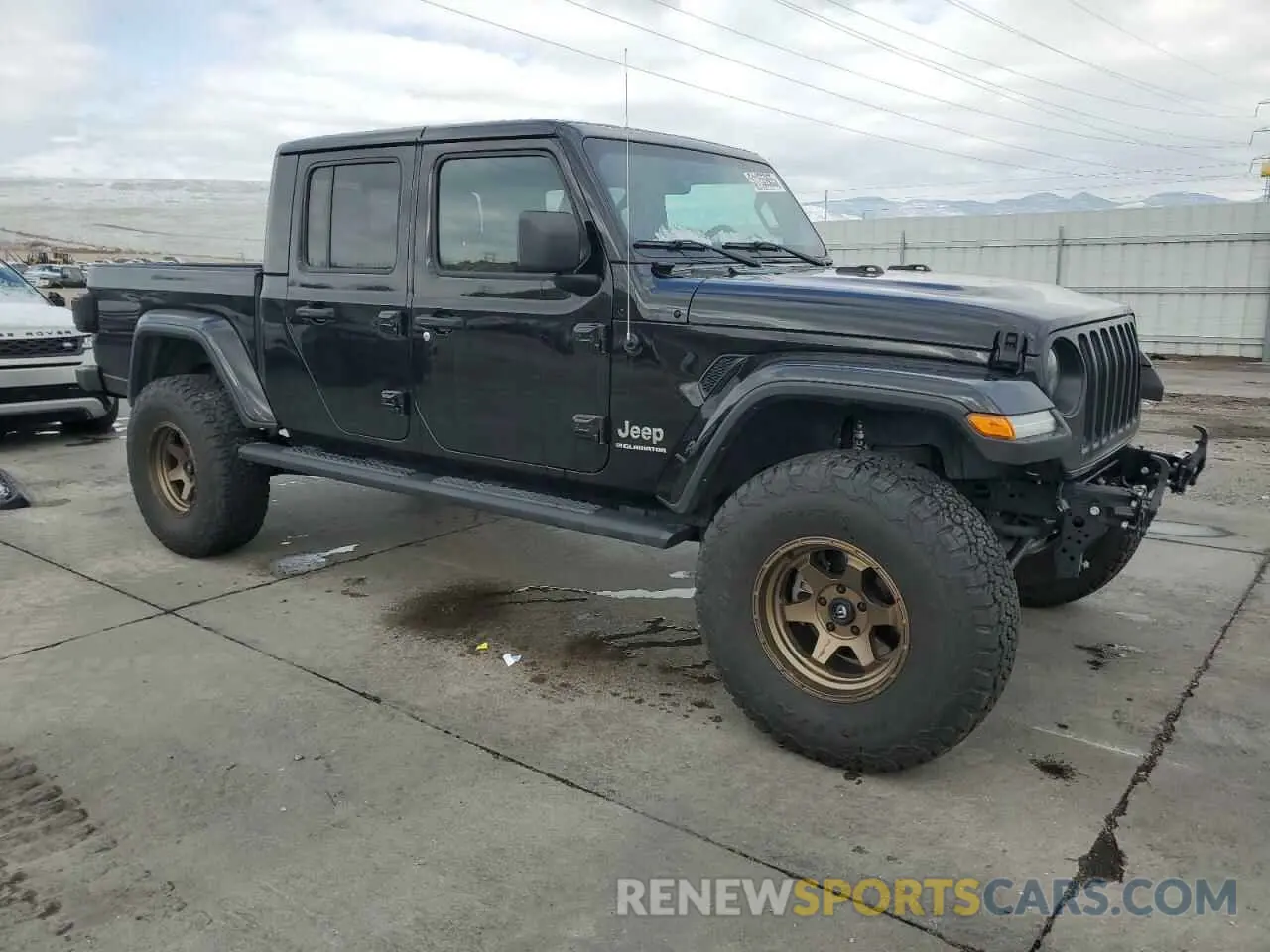 4 Photograph of a damaged car 1C6JJTFM7PL548798 JEEP GLADIATOR 2023