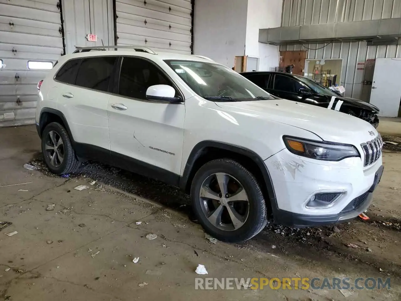 4 Photograph of a damaged car 1C4PJMDN5KD213711 JEEP GRAND CHER 2019