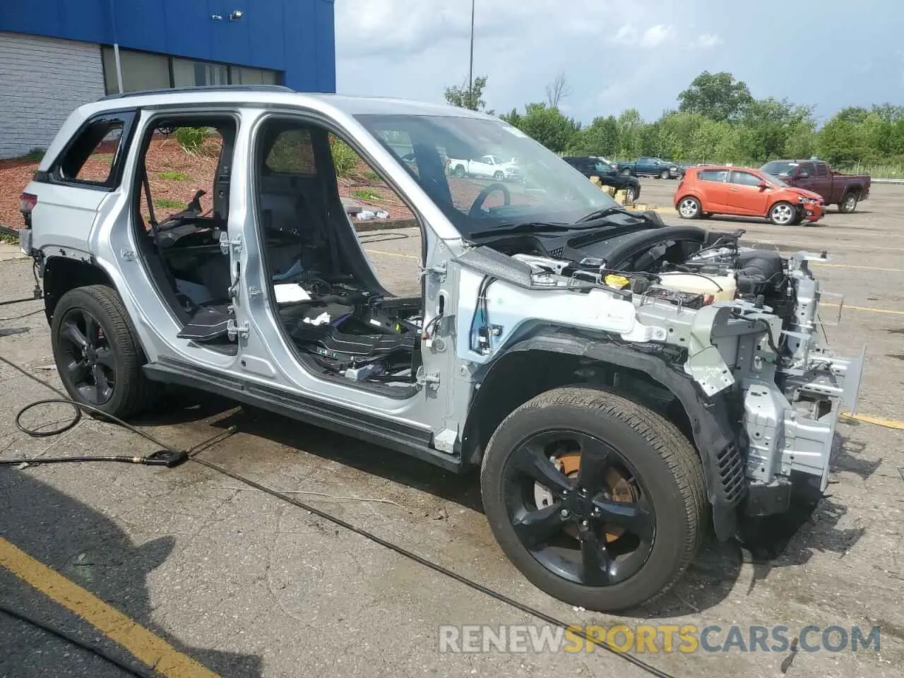 4 Photograph of a damaged car 1C4RJHAG0P8109746 JEEP GRAND CHER 2023