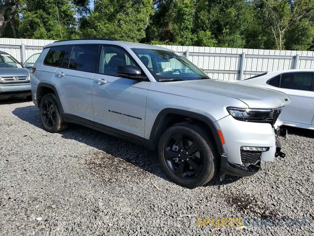 4 Photograph of a damaged car 1C4RJKBG4P8701839 JEEP GRAND CHER 2023