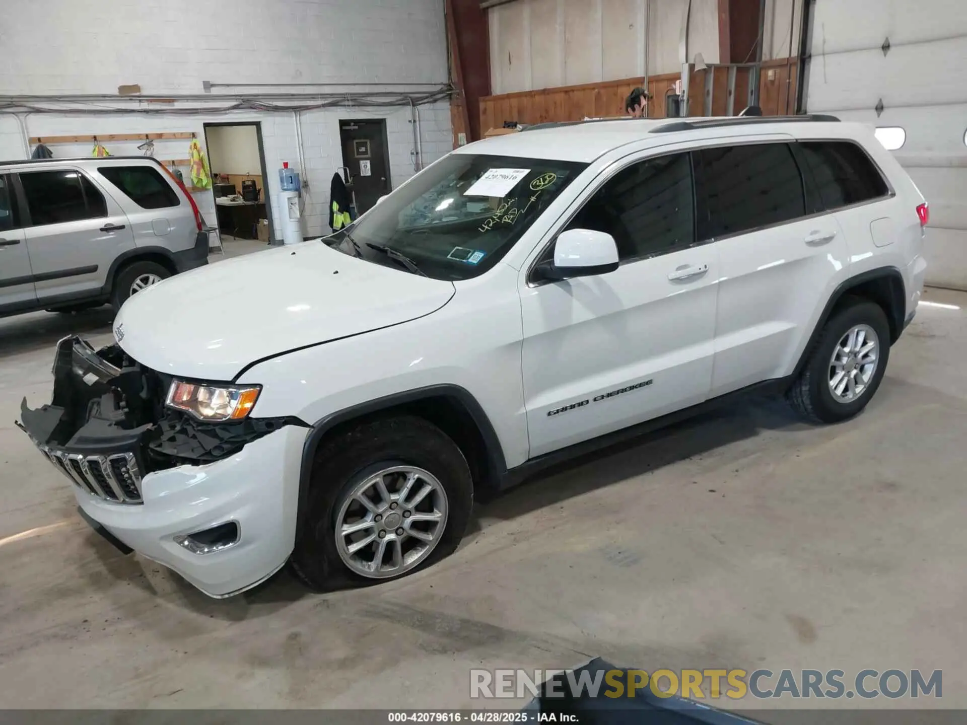 2 Photograph of a damaged car 1C4RJFAG5KC834317 JEEP GRAND CHEROKEE 2019