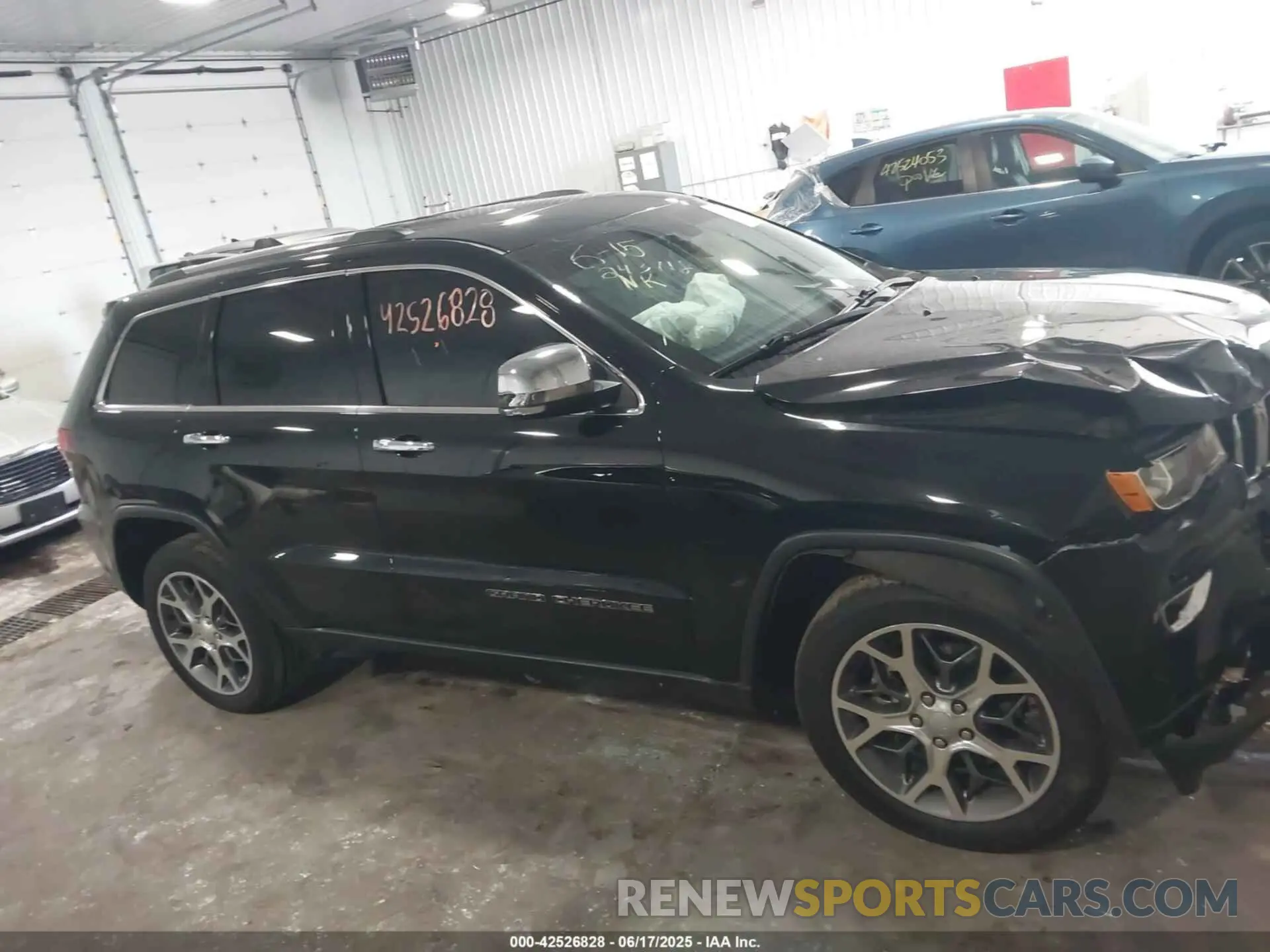 12 Photograph of a damaged car 1C4RJFBGXMC774892 JEEP GRAND CHEROKEE 2021