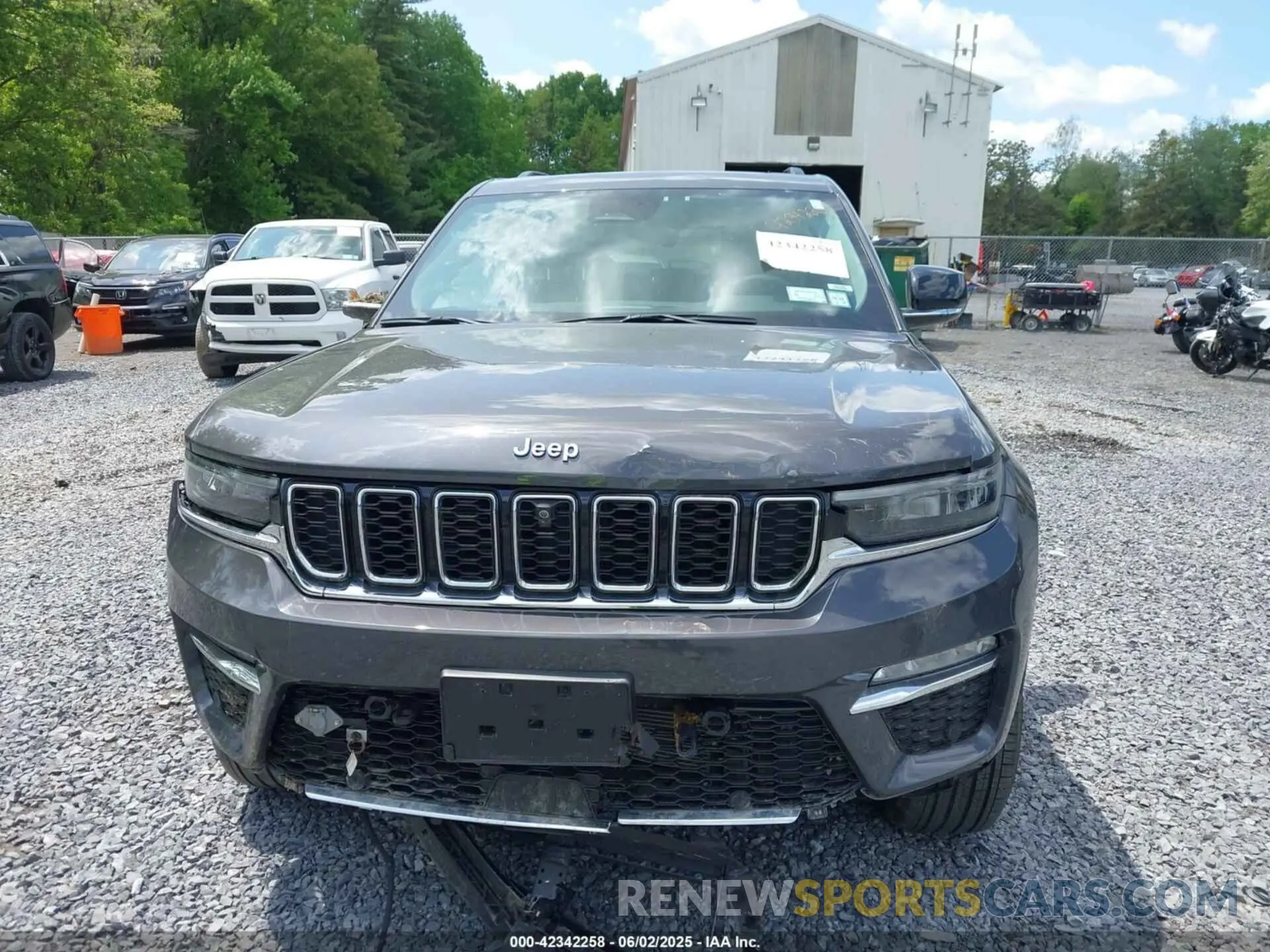 12 Photograph of a damaged car 1C4RJYB68PC665709 JEEP GRAND CHEROKEE 4XE 2023