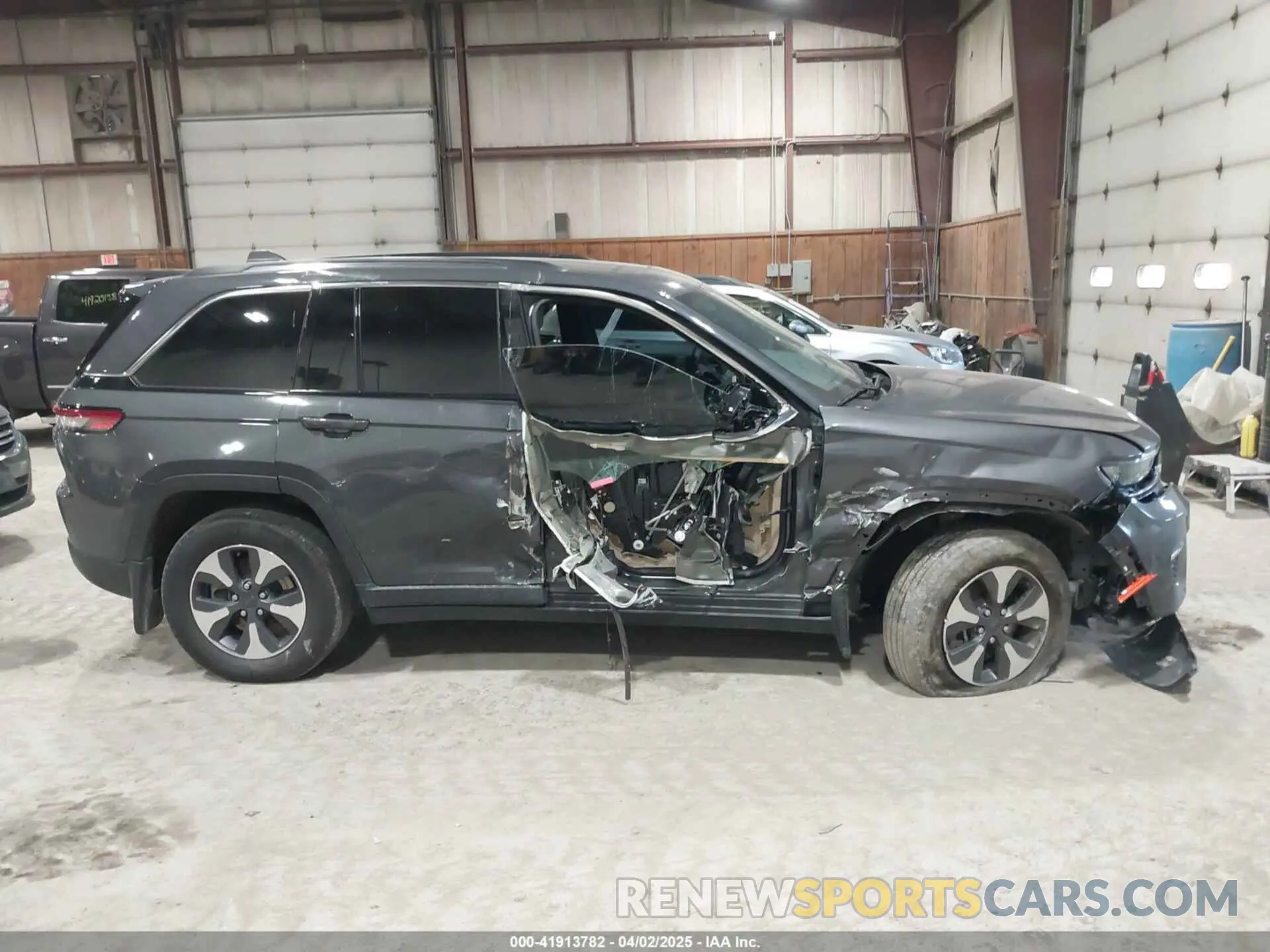 13 Photograph of a damaged car 1C4RJYB6XPC664772 JEEP GRAND CHEROKEE 4XE 2023
