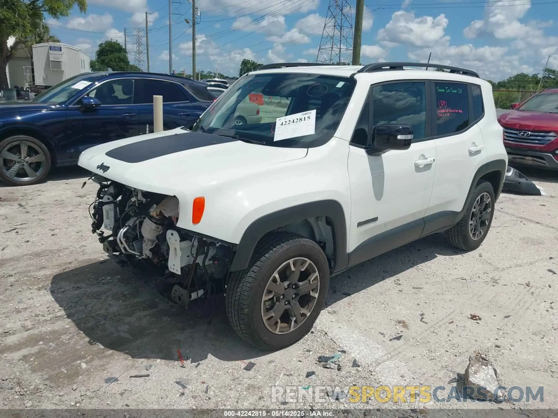 2 Photograph of a damaged car ZACNJDB12PPP39095 JEEP RENEGADE 2023
