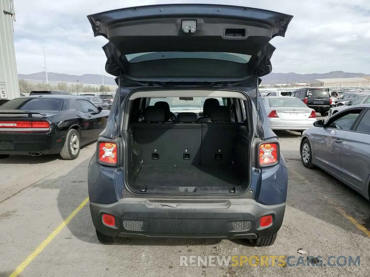 6 Photograph of a damaged car ZACNJDB16PPP41240 JEEP RENEGADE 2023
