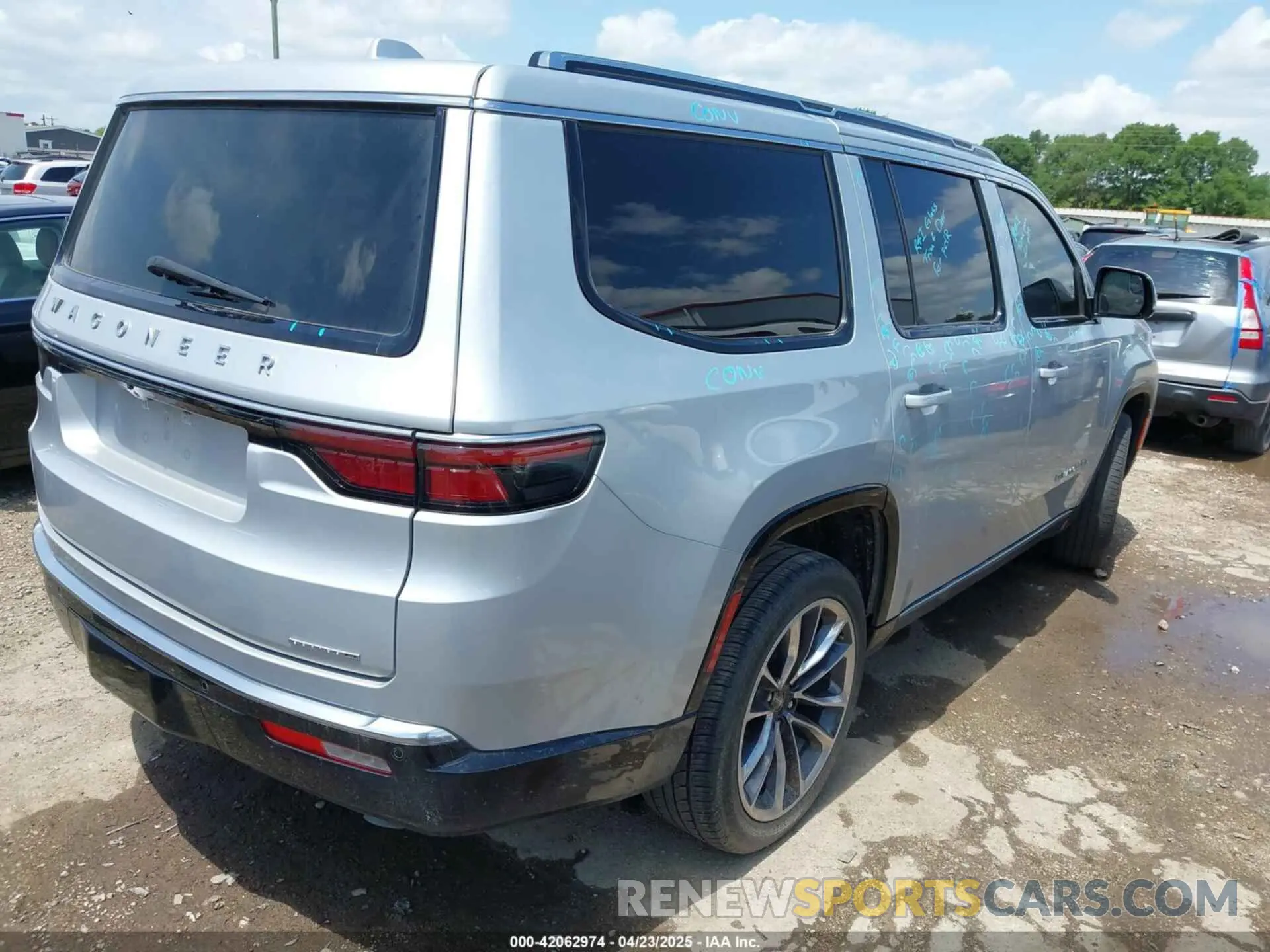 4 Photograph of a damaged car 1C4SJUDT4NS118002 JEEP WAGONEER 2022