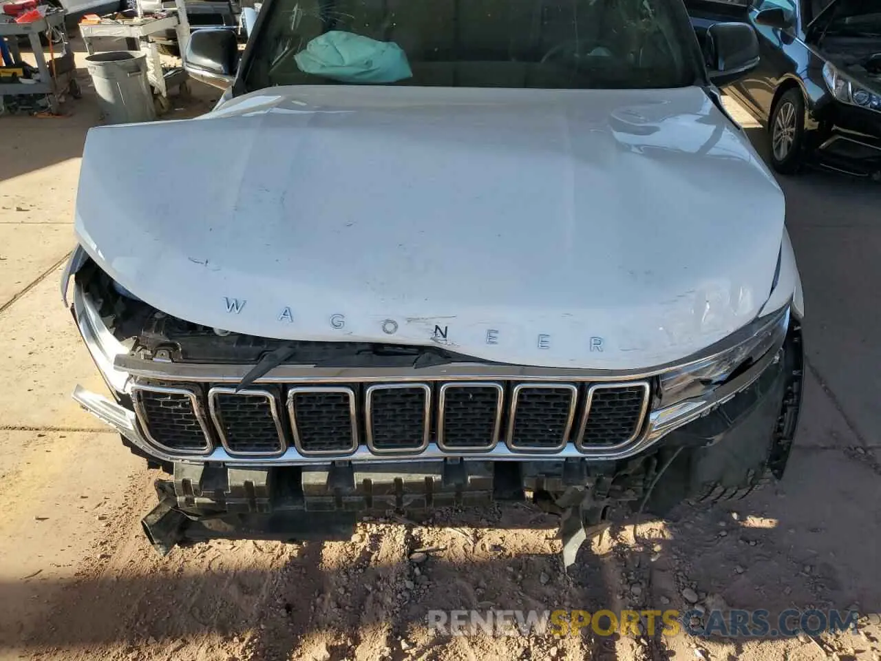 11 Photograph of a damaged car 1C4SJUDTXNS158231 JEEP WAGONEER 2022