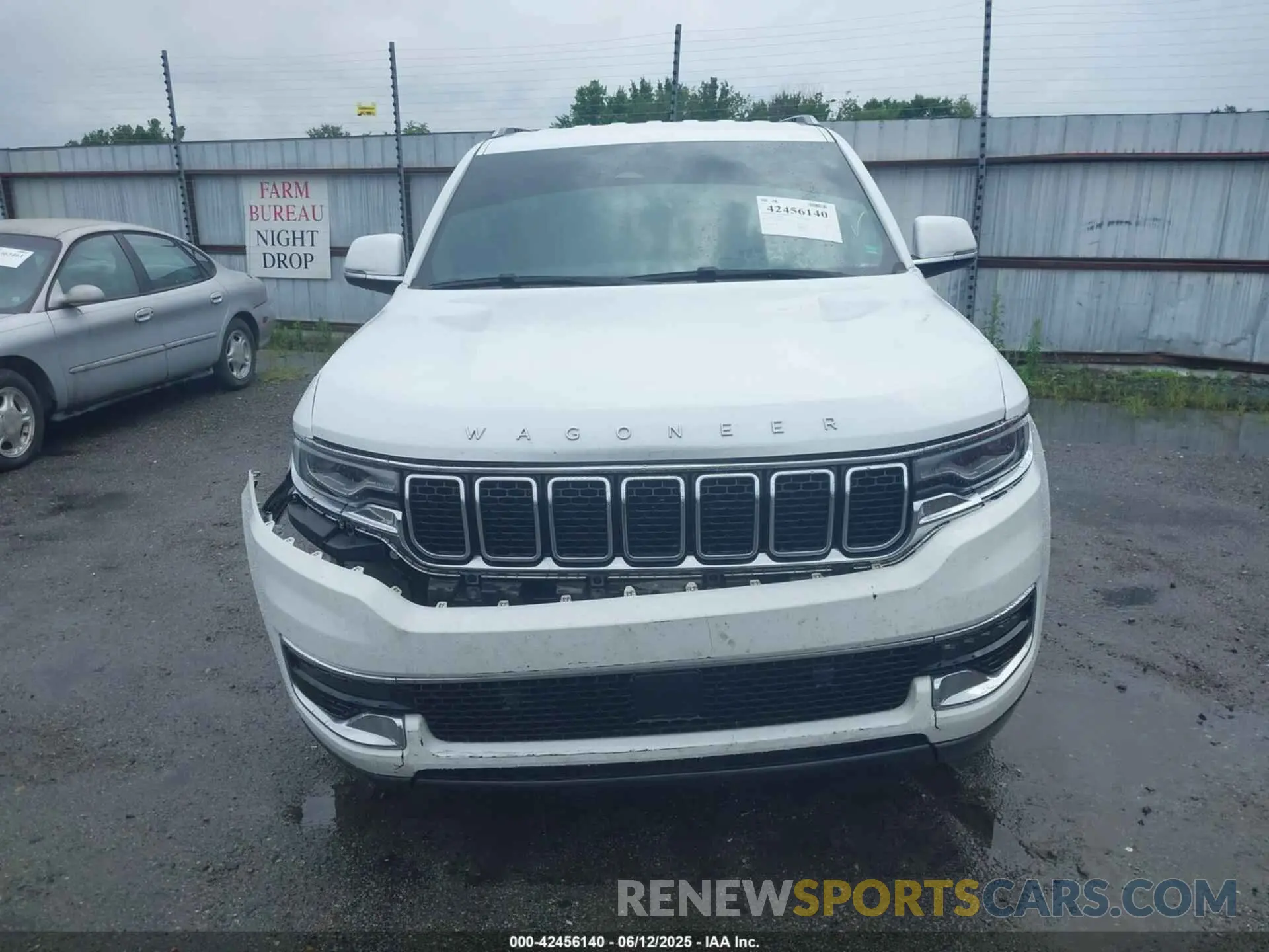 12 Photograph of a damaged car 1C4SJVAT8NS228285 JEEP WAGONEER 2022
