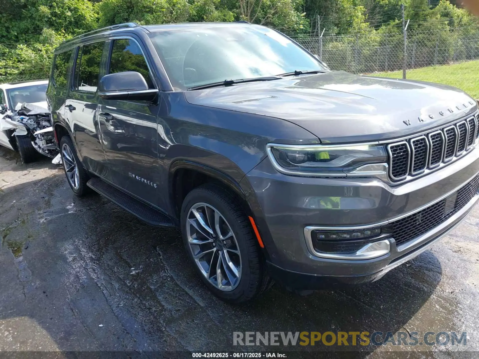 1 Photograph of a damaged car 1C4SJVBT1NS135171 JEEP WAGONEER 2022