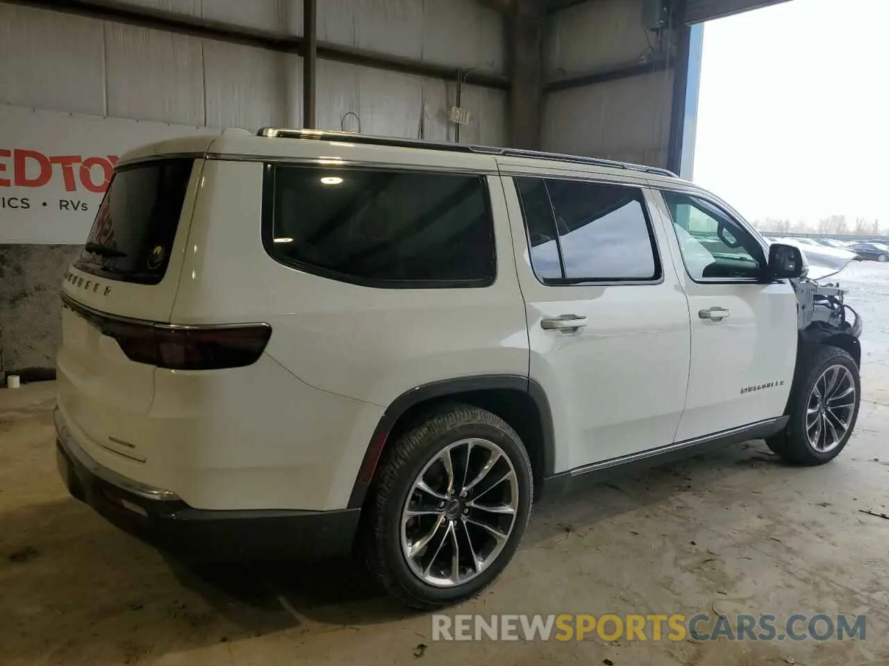 3 Photograph of a damaged car 1C4SJVDT4NS101691 JEEP WAGONEER 2022