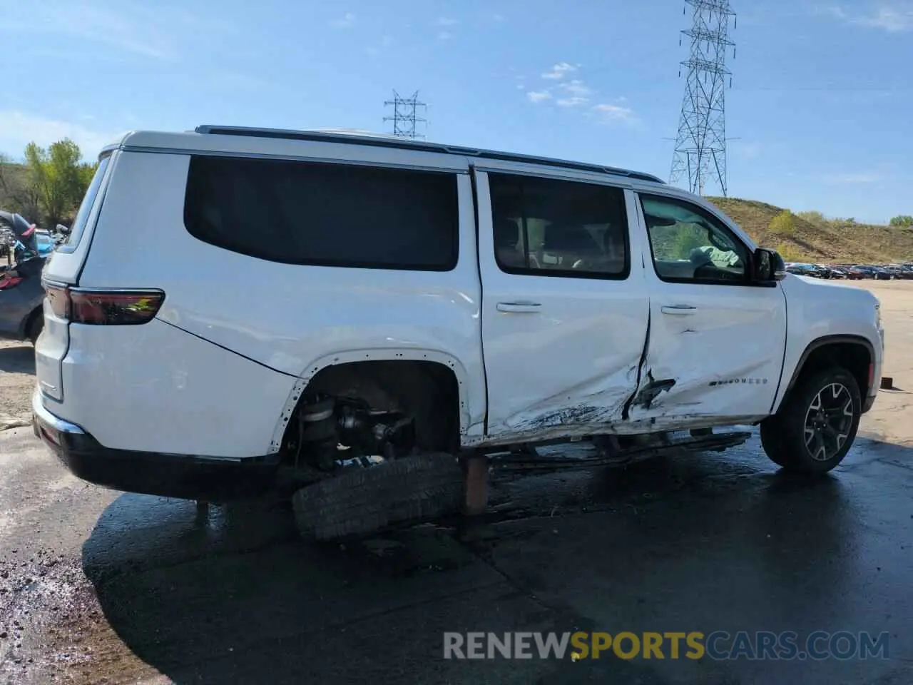 3 Photograph of a damaged car 1C4SJSDP8PS540588 JEEP WAGONEER 2023