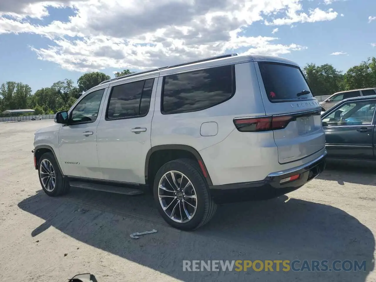 2 Photograph of a damaged car 1C4SJVBP1PS561660 JEEP WAGONEER 2023