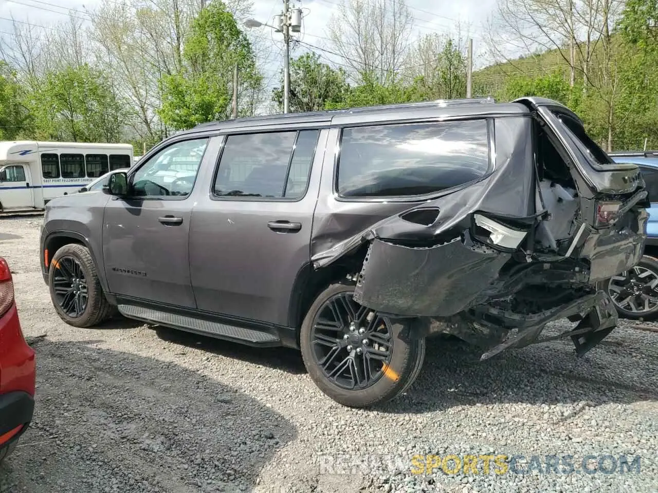 2 Photograph of a damaged car 1C4SJVBP7PS553448 JEEP WAGONEER 2023