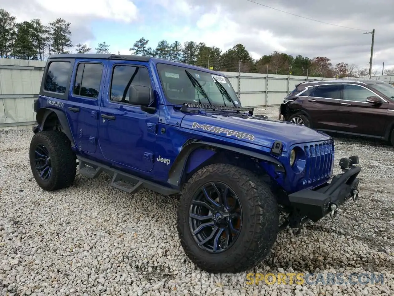 4 Photograph of a damaged car 1C4HJXDGXLW311002 JEEP WRANGLER 2020