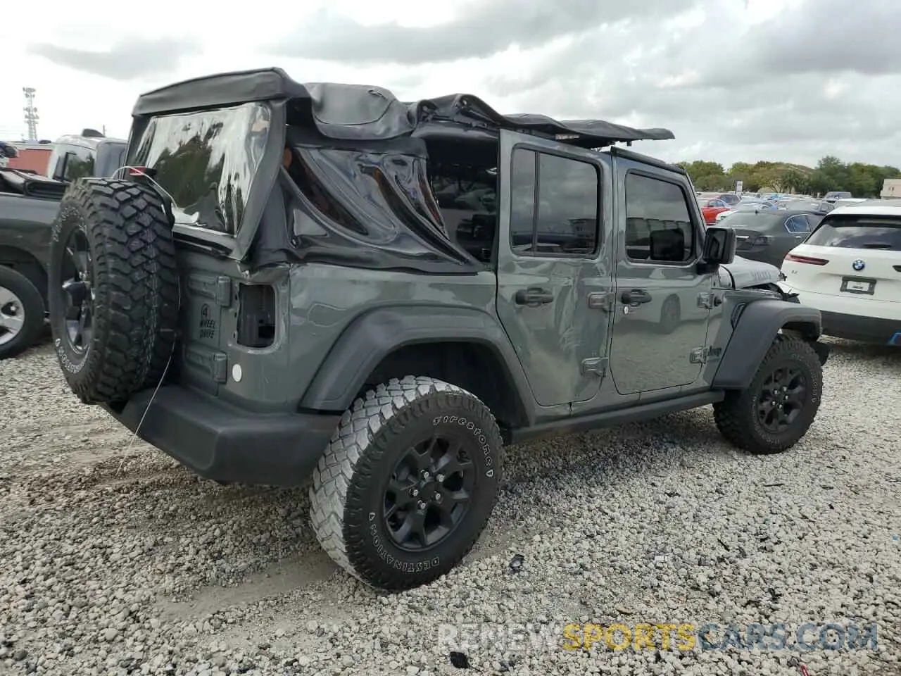 3 Photograph of a damaged car 1C4HJXDM6MW628041 JEEP WRANGLER 2021