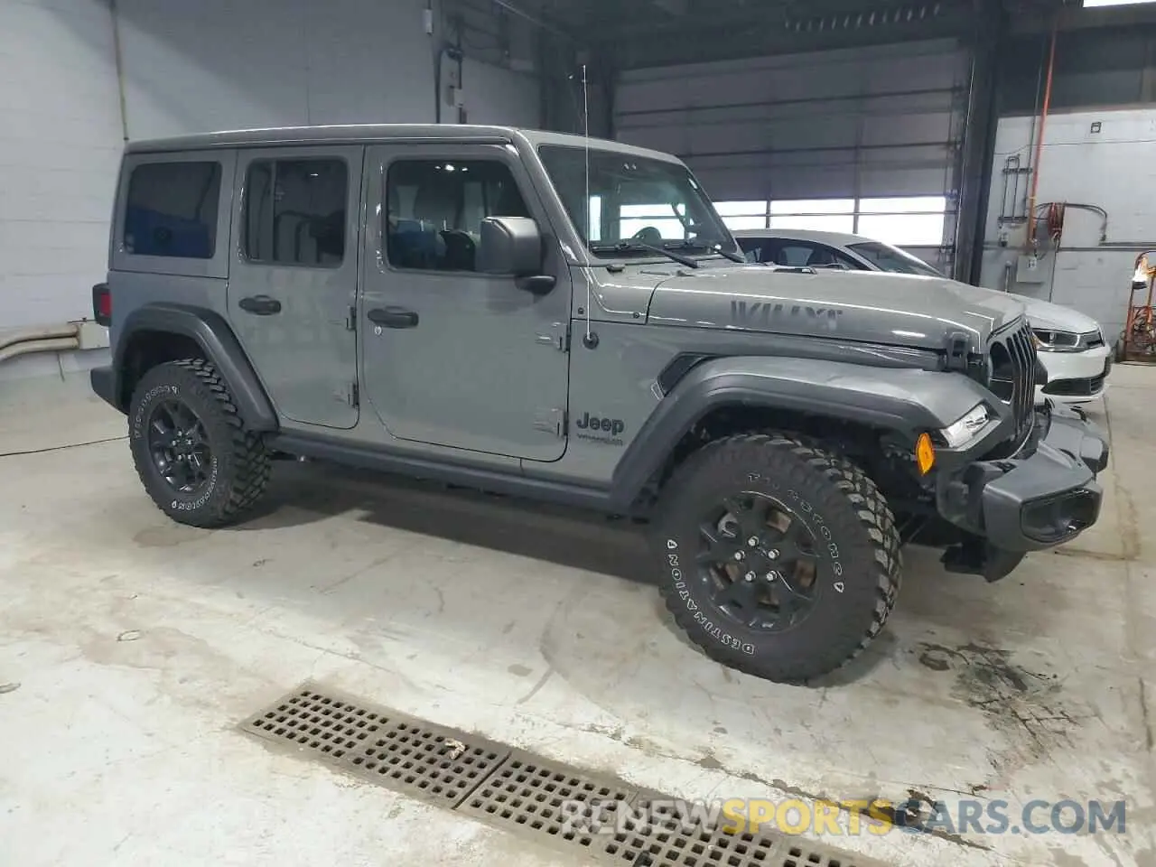 4 Photograph of a damaged car 1C4HJXDN3MW570110 JEEP WRANGLER 2021