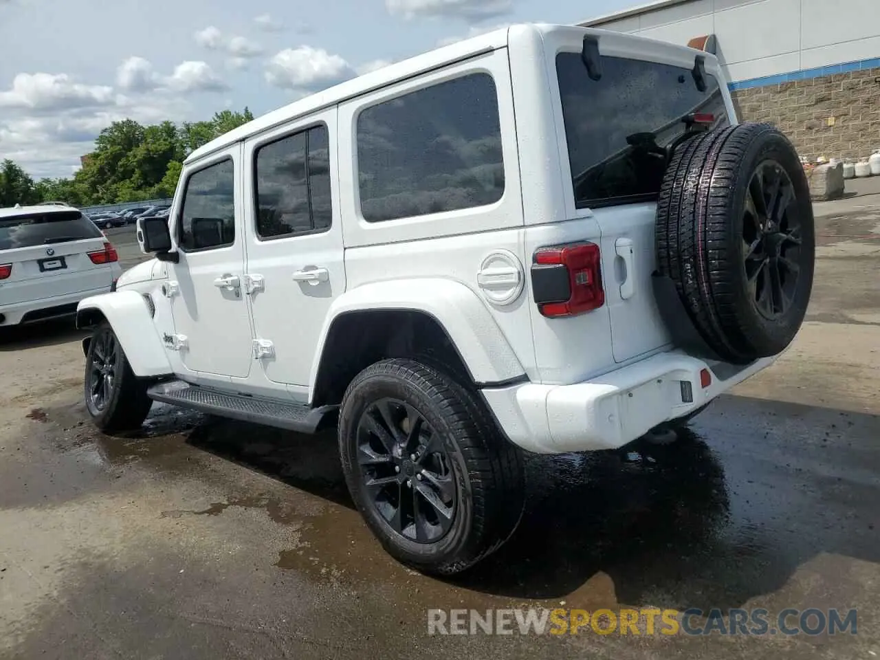 2 Photograph of a damaged car 1C4HJXEN2MW767414 JEEP WRANGLER 2021