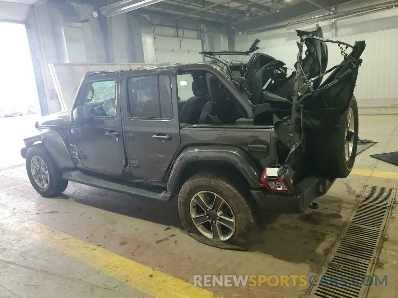 2 Photograph of a damaged car 1C4HJXEN6MW609397 JEEP WRANGLER 2021