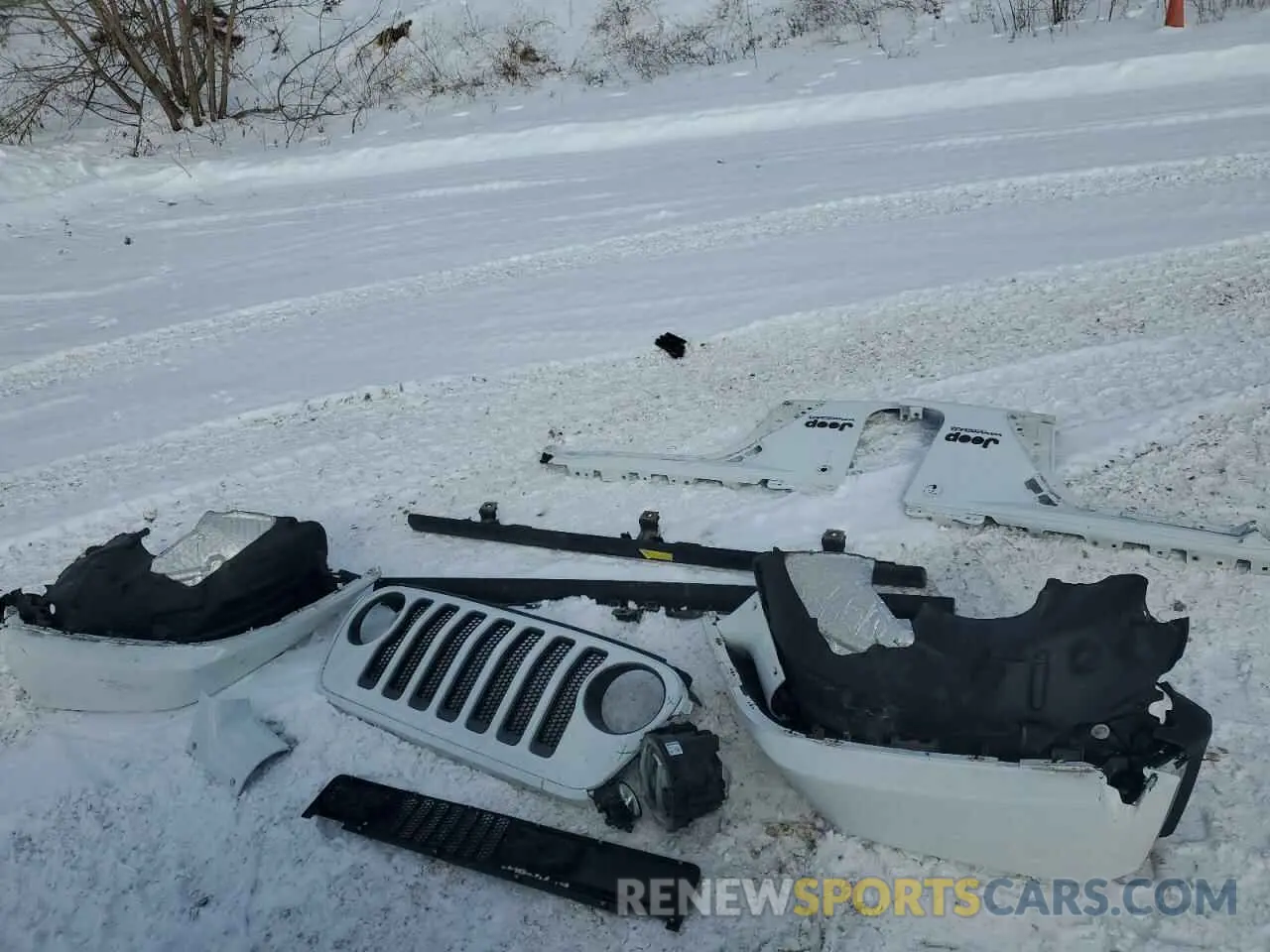 12 Photograph of a damaged car 1C4HJXFG9MW702608 JEEP WRANGLER 2021