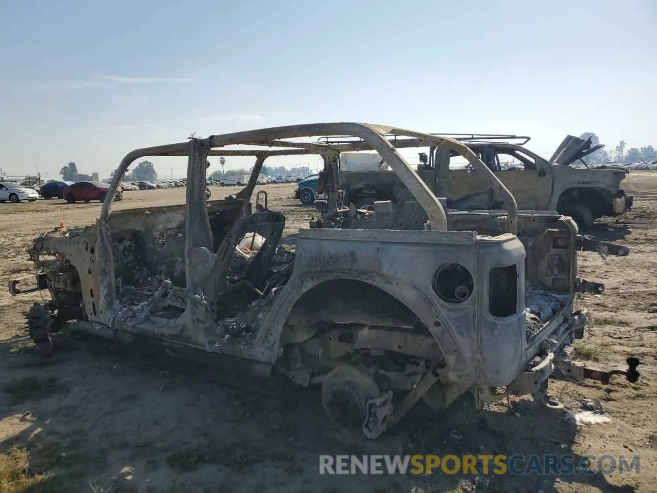 2 Photograph of a damaged car 1C4HJXFN1MW744432 JEEP WRANGLER 2021