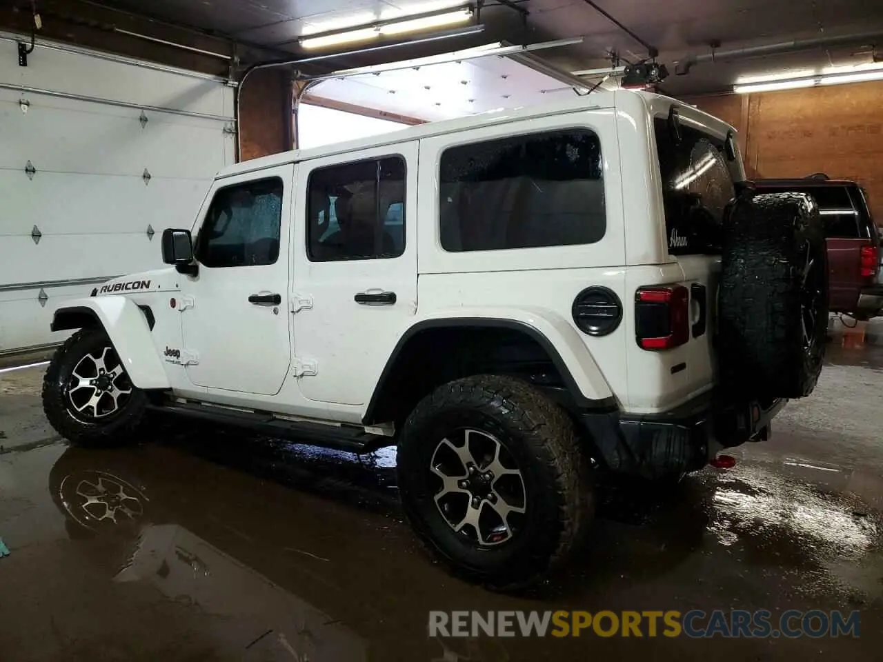 2 Photograph of a damaged car 1C4JJXFM2MW633915 JEEP WRANGLER 2021