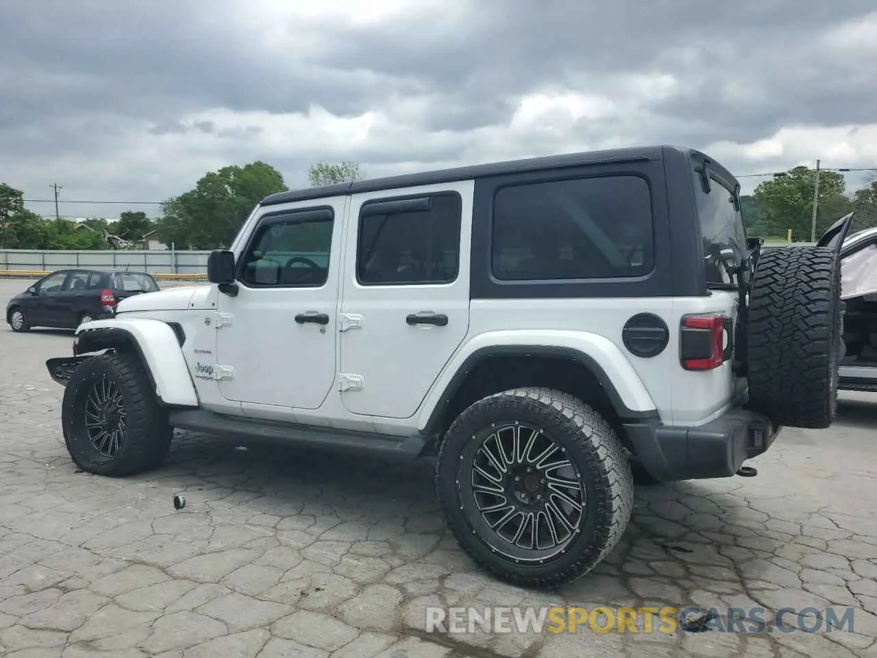 2 Photograph of a damaged car 1C4HJXEN0NW262439 JEEP WRANGLER 2022