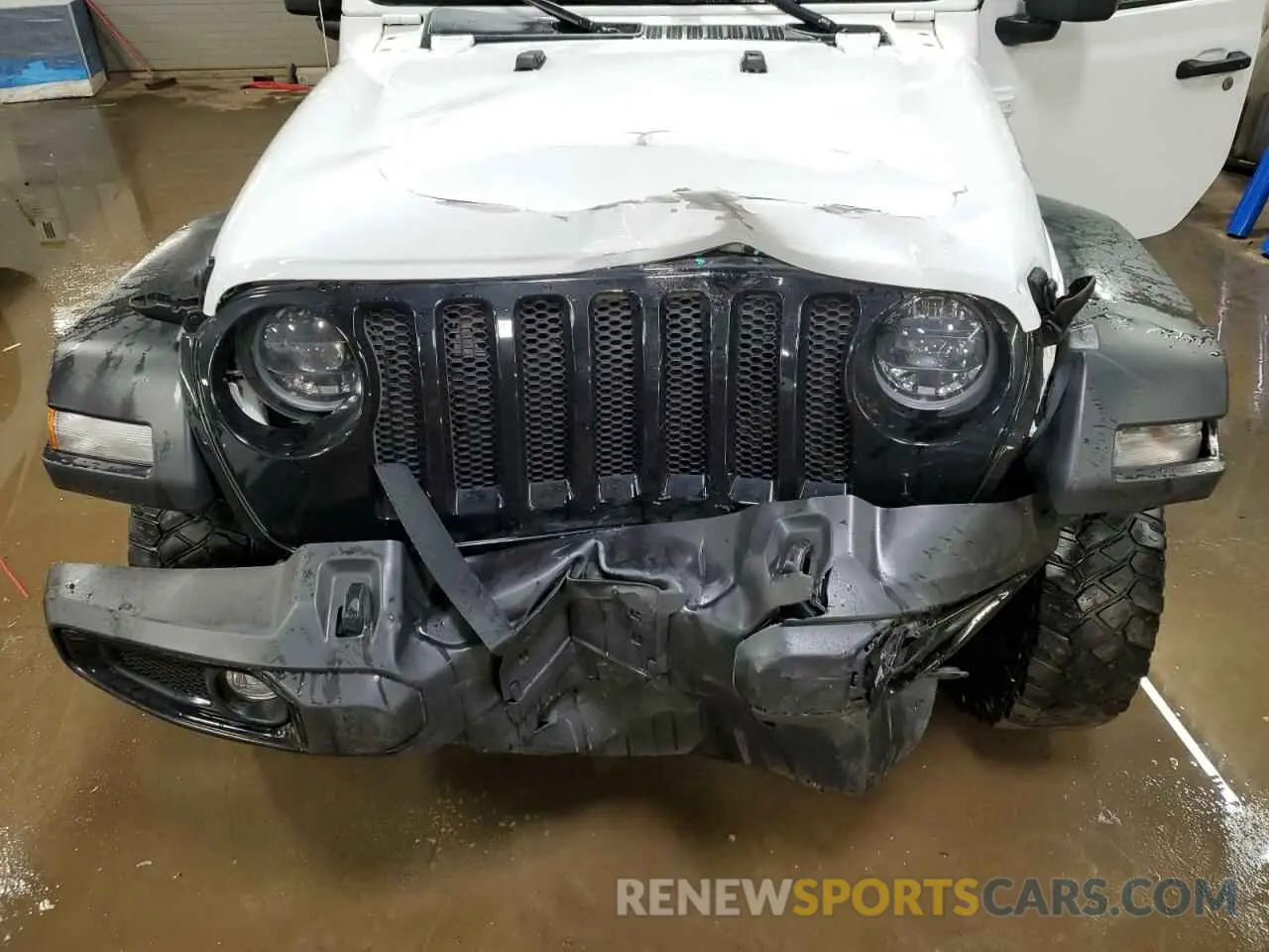11 Photograph of a damaged car 1C4HJXAG1PW533390 JEEP WRANGLER 2023