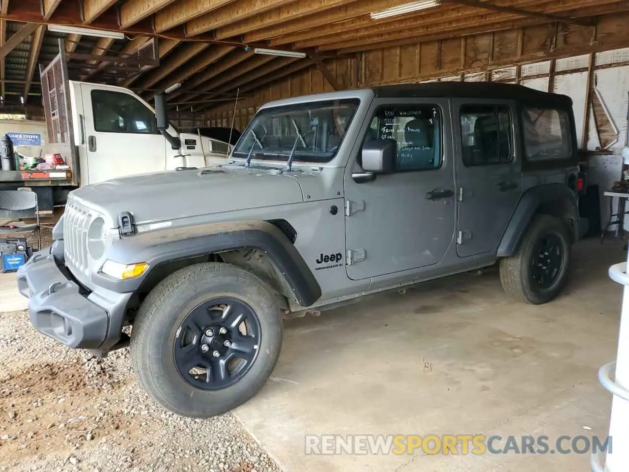 1 Photograph of a damaged car 1C4HJXDG0PW697757 JEEP WRANGLER 2023