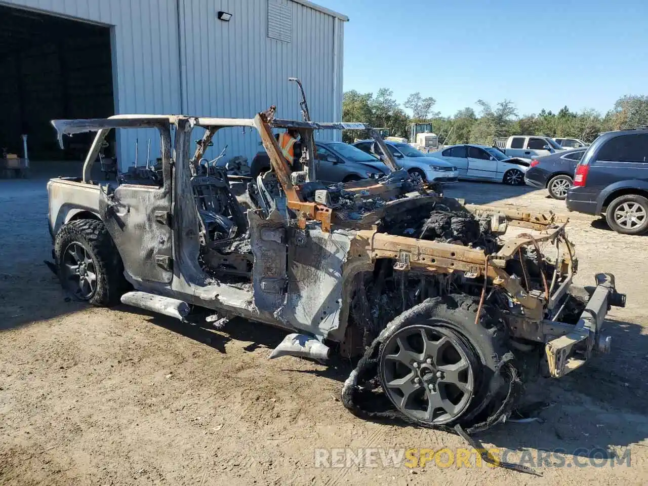 4 Photograph of a damaged car 1C4HJXDN3PW509506 JEEP WRANGLER 2023