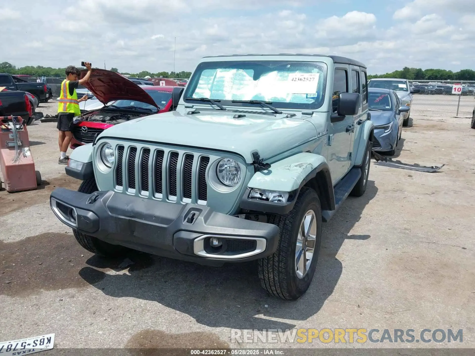 2 Photograph of a damaged car 1C4HJXEN2PW601172 JEEP WRANGLER 2023