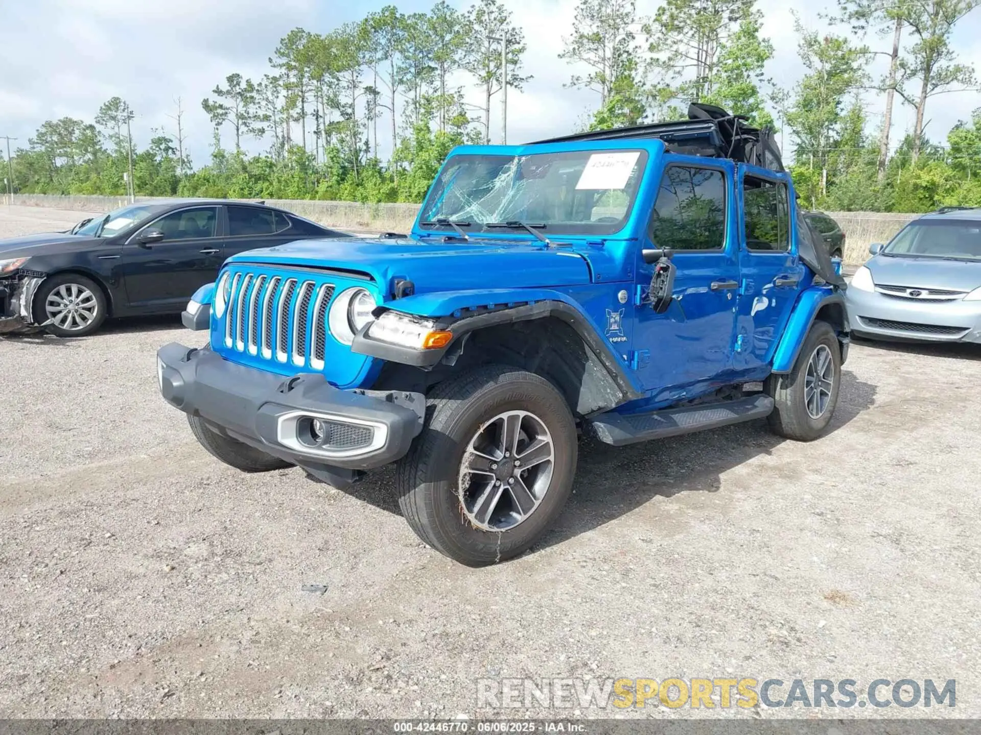 2 Photograph of a damaged car 1C4HJXEN6PW686565 JEEP WRANGLER 2023