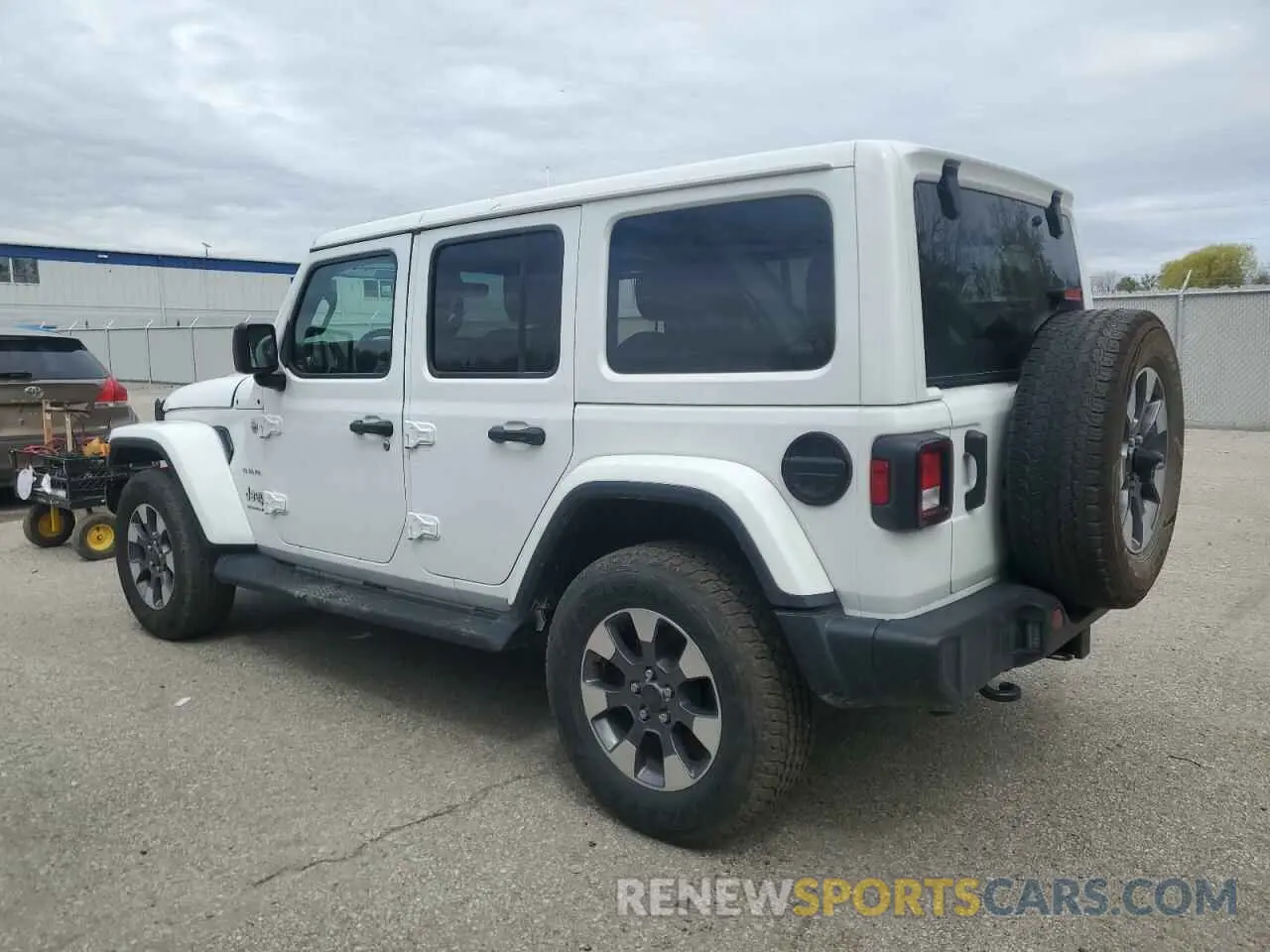2 Photograph of a damaged car 1C4HJXEN7PW631042 JEEP WRANGLER 2023