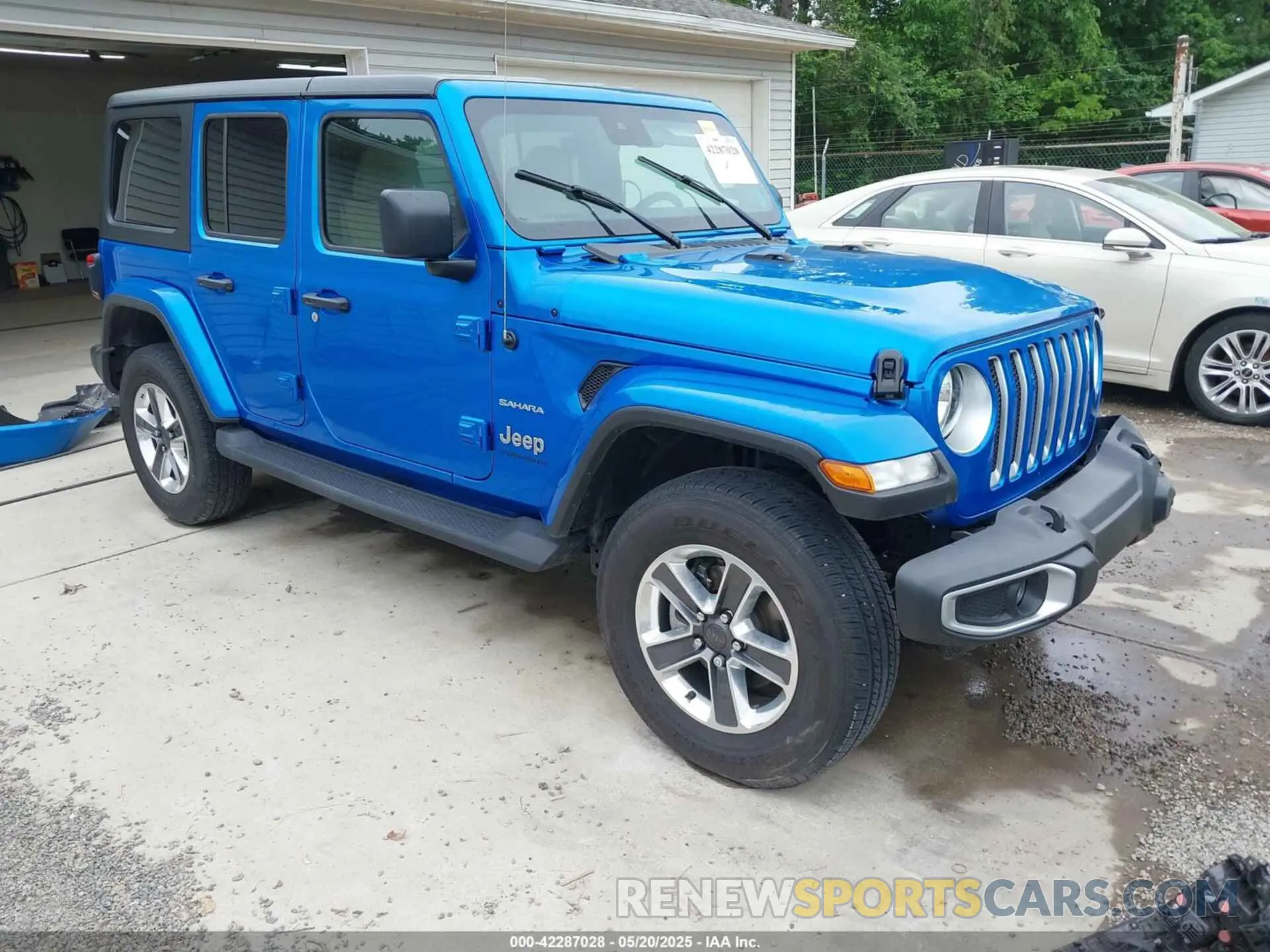 1 Photograph of a damaged car 1C4HJXEN9PW508133 JEEP WRANGLER 2023
