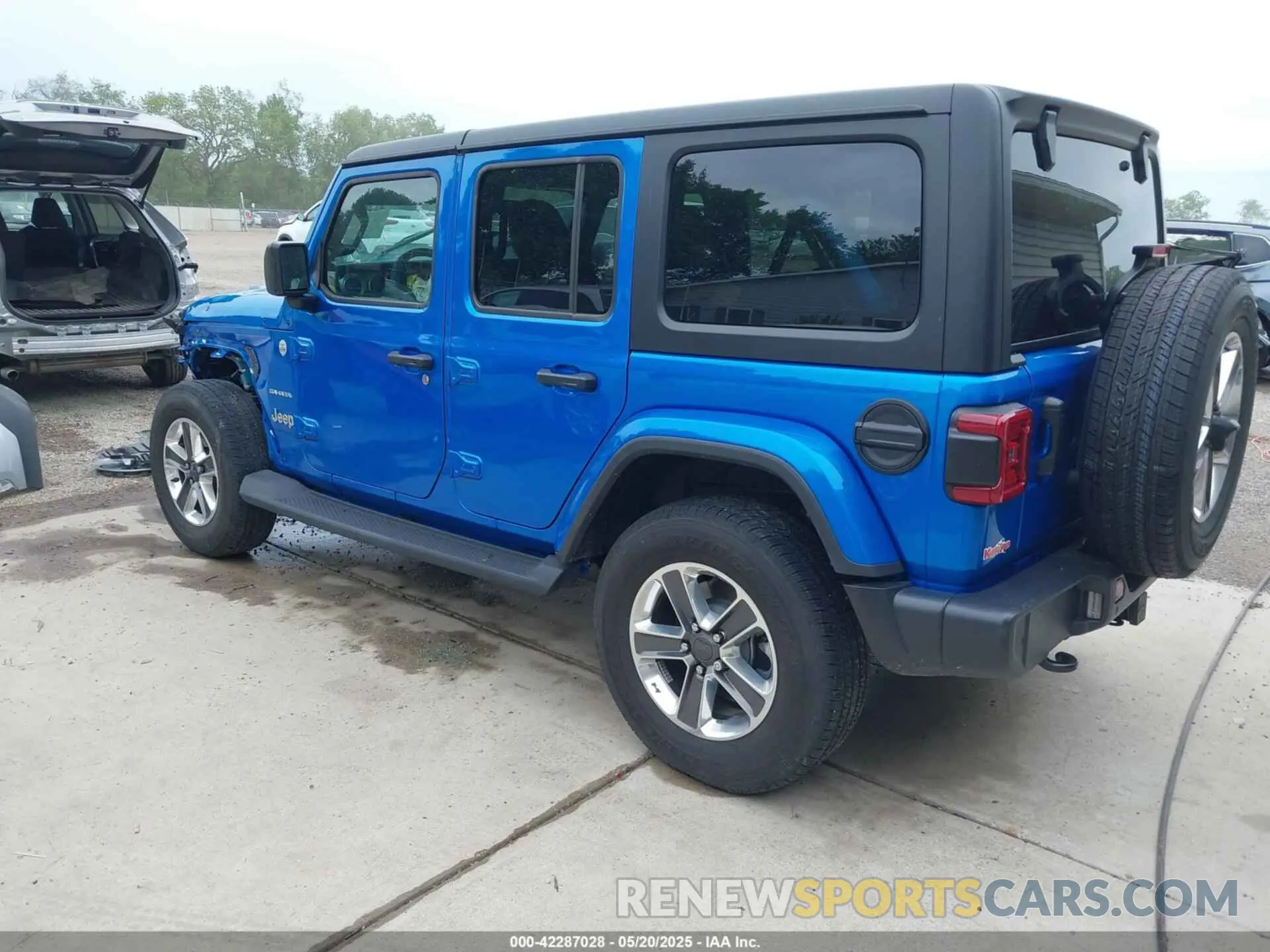 3 Photograph of a damaged car 1C4HJXEN9PW508133 JEEP WRANGLER 2023