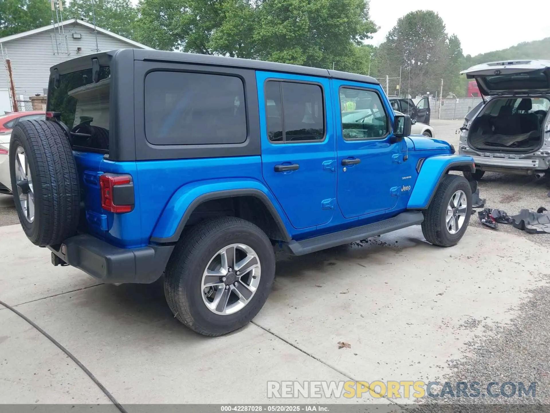4 Photograph of a damaged car 1C4HJXEN9PW508133 JEEP WRANGLER 2023
