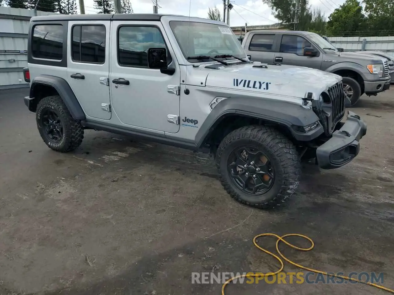 4 Photograph of a damaged car 1C4JJXN64PW630179 JEEP WRANGLER 2023