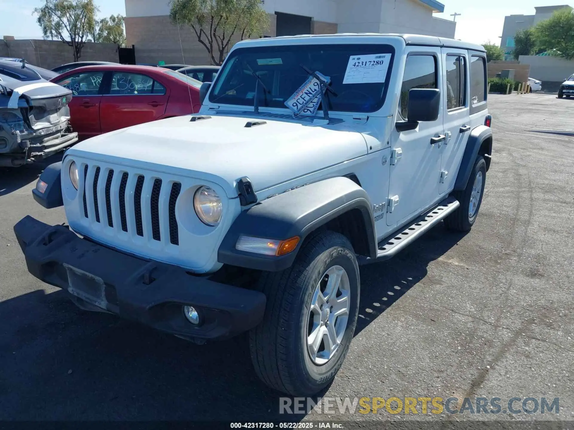 2 Photograph of a damaged car 1C4HJXDN4KW570520 JEEP WRANGLER UNLIMITED 2019
