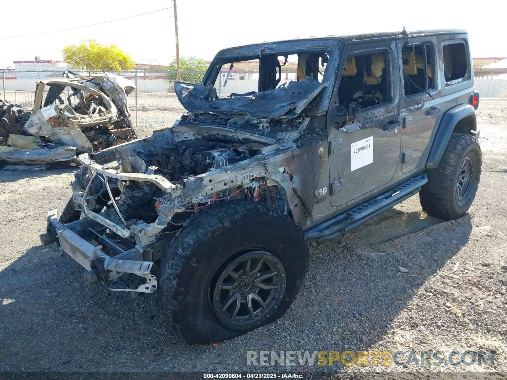 2 Photograph of a damaged car 1C4HJXDN8KW617970 JEEP WRANGLER UNLIMITED 2019