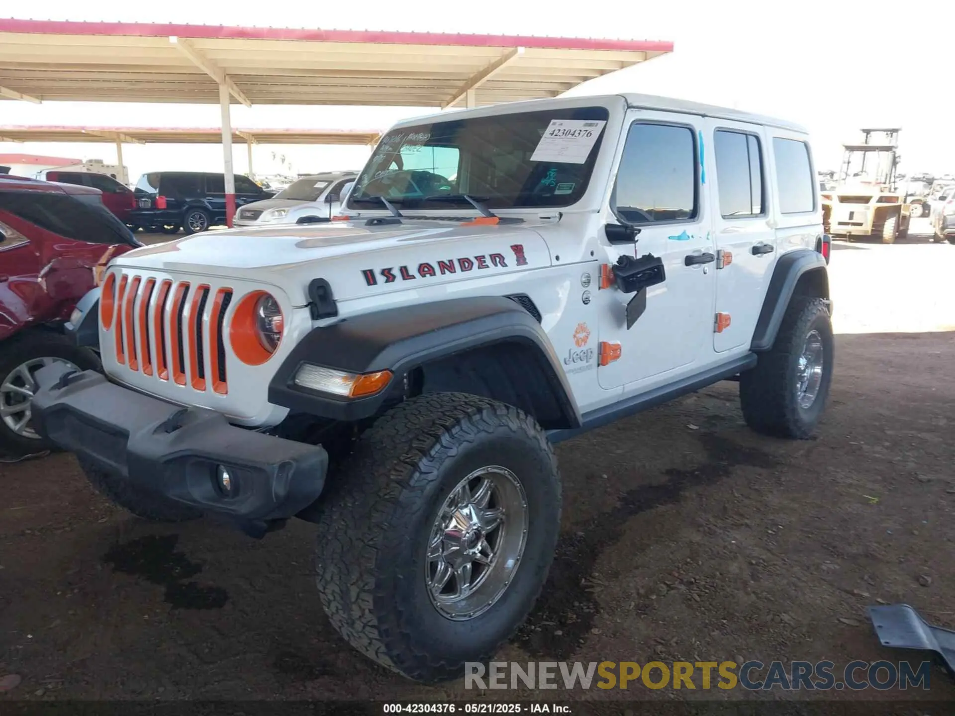 2 Photograph of a damaged car 1C4HJXDG2MW575235 JEEP WRANGLER UNLIMITED 2021
