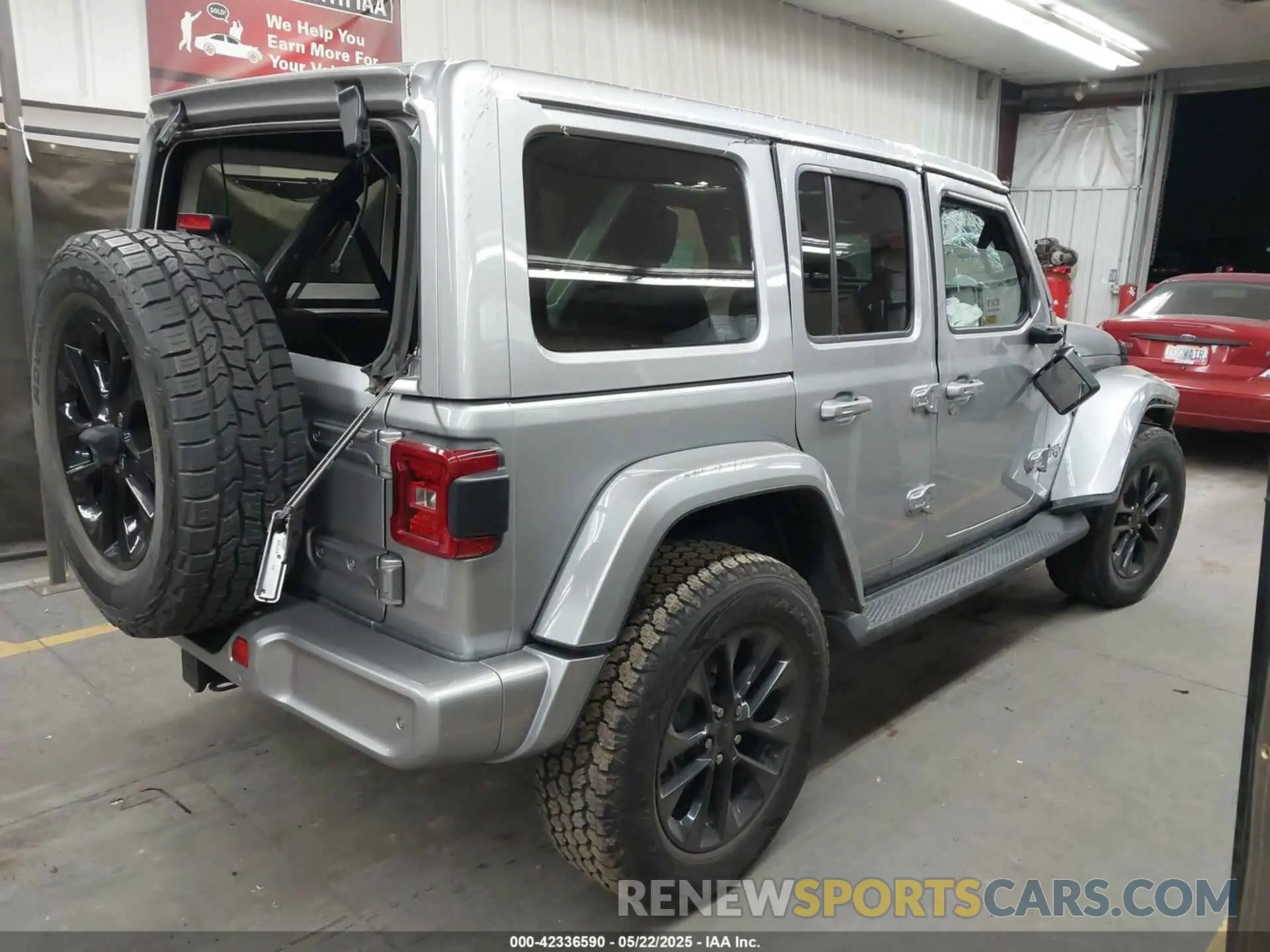 4 Photograph of a damaged car 1C4HJXEN1MW529568 JEEP WRANGLER UNLIMITED 2021