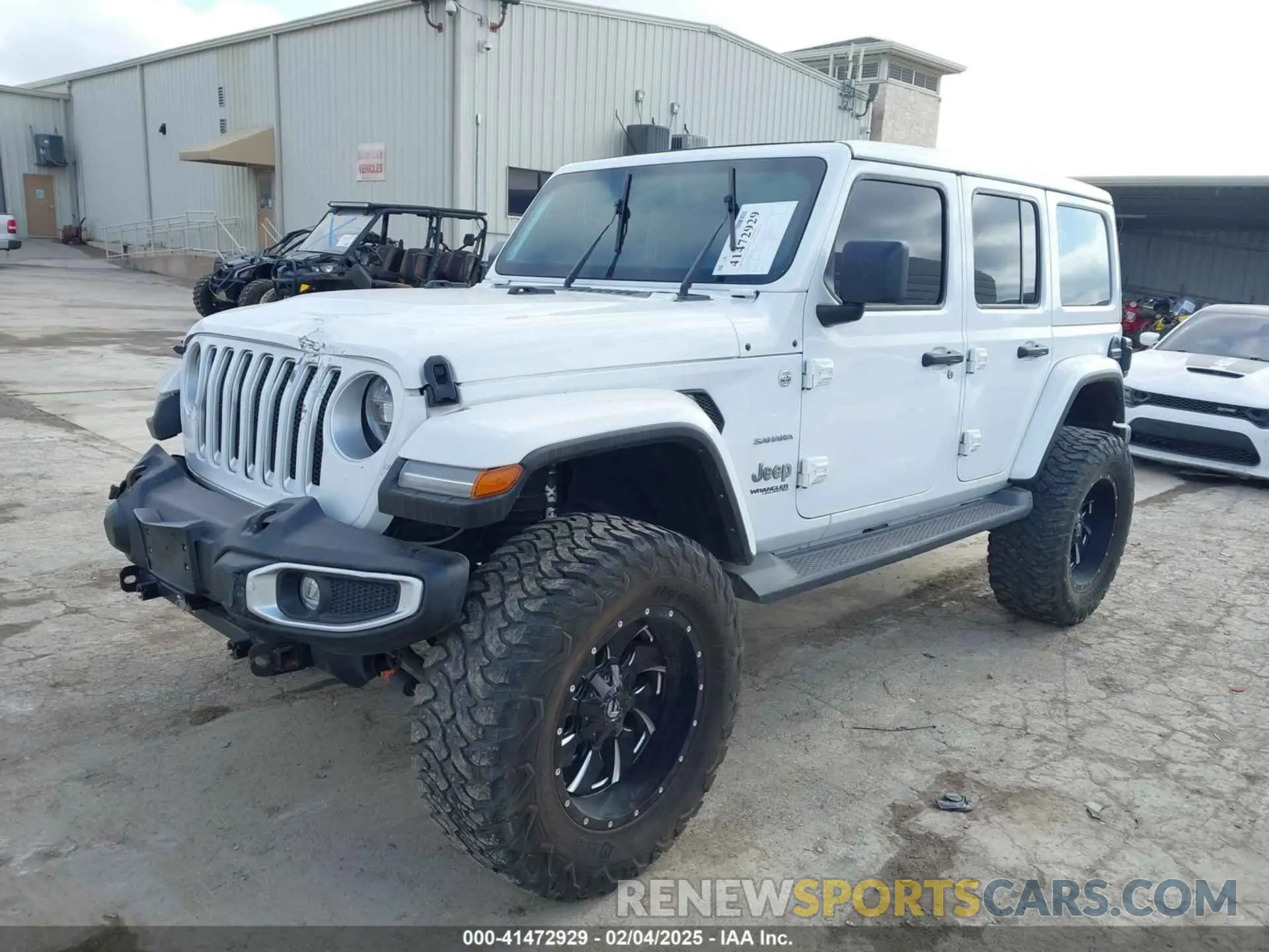 2 Photograph of a damaged car 1C4HJXEN3MW717895 JEEP WRANGLER UNLIMITED 2021